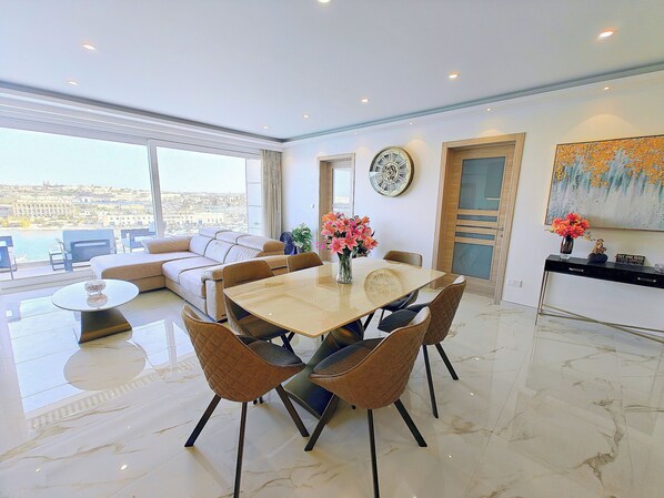 Dining Table: The table can seat 6 people, and when opened, it accommodates 10p