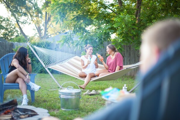 Gather with friends in the backyard