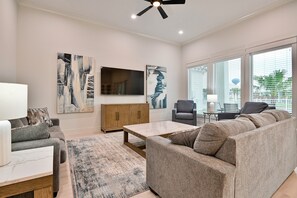 Living area with Smart TV, and comfy seating