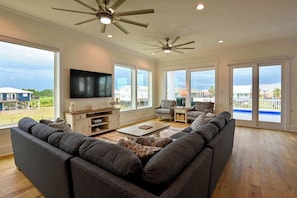 Curl up in the chic living room & stream your favorites on the smart TV
