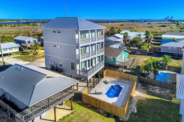 Just a 5-minute stroll from the beach, this 3879 sq ft house with 8 bedrooms and a private pool promises endless fun and unforgettable beachside adventures!