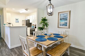 Dining area with table and seating for 6