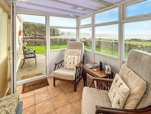 Sun room | Fishers Croft Holiday Cottage, Sandyhills