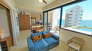 Wall of windows opens almost fully across the entire condo!