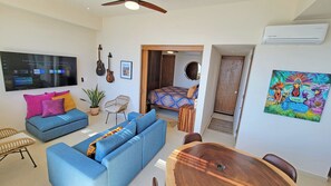 Comfortable seating for 4 with a 65" Samsung smart TV.