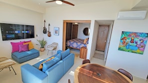 Comfortable seating for 4 with a 65" Samsung smart TV.