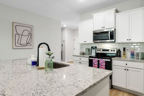 Kitchen is equipped with all brand new appliances