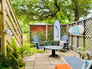 Private sun patio with adirondacks, coffee table and lounger!