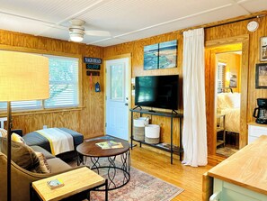 Spectrum streaming TV service with HBO/Max channels in living area and bedroom.