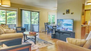 The open living space enjoys natural lighting and is cool thanks to the trees.