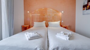 Relax on the comfy bed after a day outside.