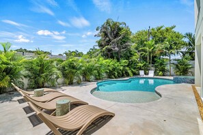 Pool View with chaise lounges.