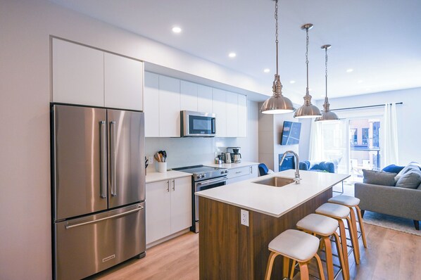 Kitchen and living area where you can gather to make plans and recount the day.