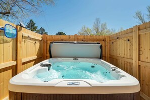 Relax and unwind in the luxurious hot tub of our Colorado Springs retreat. Soak away your worries under the stars for the ultimate getaway experience