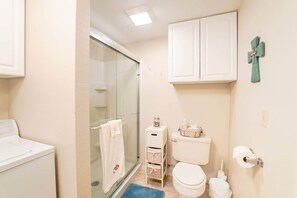 A compact, well-organized bathroom.