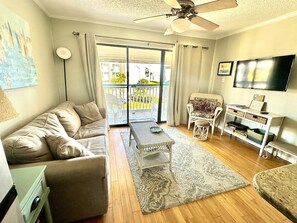 Balcony Accessed through comfortably furnished Living Room