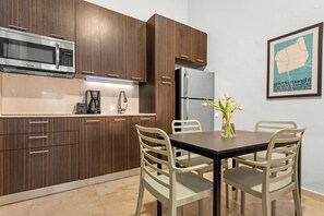 The modern and fully equipped and stocked kitchen and dining table