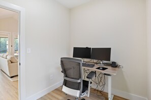 Dedicated workspace with dual monitors, ergonomic chair, and USB-C Laptop Dock. Ideal for remote work while enjoying your lake retreat.