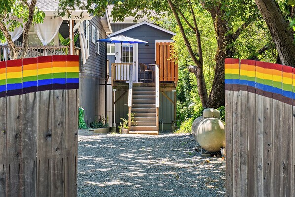 Adorable mini-house on a three unit riverfront property