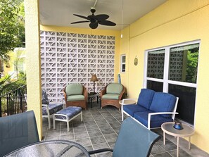 Large covered patio with ceiling fans
