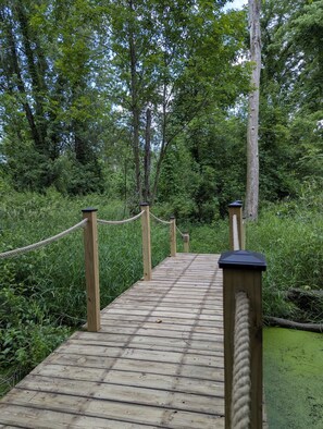 New Bridge Installed June 2025! Now take a stroll to fish or kayak in the Little Calumet River. Bring your own equipment for now. Kayaks & fishing gear not available yet