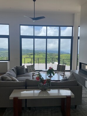 Living room with a view of Arenal Volcano