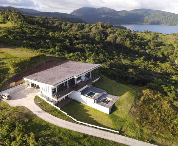 Ariel view of the house with Lake Cote and Tenorio National Park.