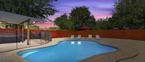 Dive into our sparkling blue pool, perfect for cooling off in the Texas heat.