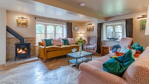 Upper Lodge's Sitting room feels cosy and spacious