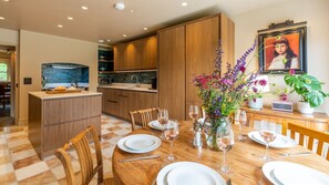 Upper Lodge's light soaked kitchen and dining area exudes charm