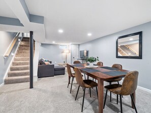 Enjoy meals in the sunroom with seating for up to 8 guests.