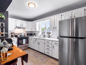 Cook your favorite meals in our fully equipped kitchen with modern appliances.