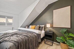 Indulge in unparalleled comfort in the master bedroom, featuring a luxurious king-size bed, blackout shades, high-quality linens and mattress, and a 55" TV complete with Netflix for your entertainment pleasure.
