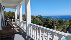 Balcony 1 View to the Swimming Pool, Sun Lounge, Garden, Sea and Mountain.