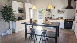 Open Space Living Room, Dining Area and Kitchen.