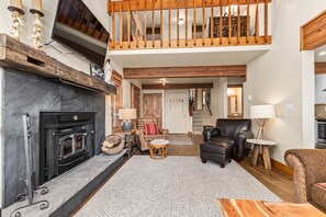 Main Level Living Room Looking up to Loft