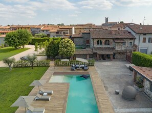 Activities, Amenities, Balcony / Terrace / Patio, Building Exterior, Golf, Pool, Spring, Summer, Wellness