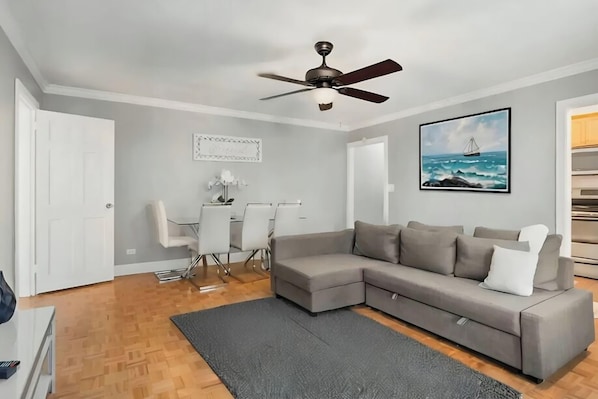Spacious living and dining space with plenty of seating and entertainment!