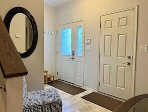 Beautiful entryway with all you need on your way in and out of the house.