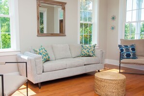 Living room with a queen sofa sleeper.