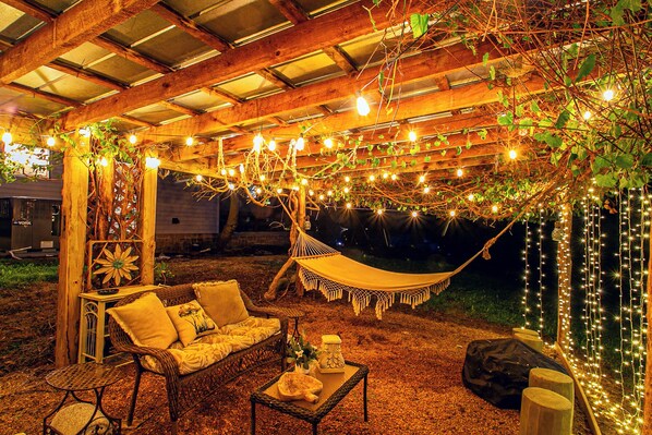 Gather with your tribe in this cozy place filled with lights and magic