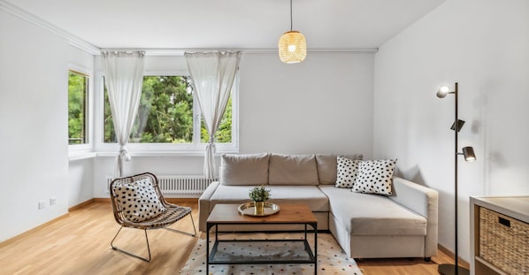 Relax and unwind in this charming living room.