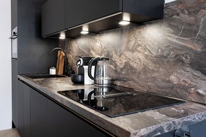 From morning coffee to evening dinners, this kitchen is the perfect setting to relax and enjoy good food.