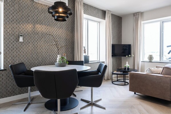Kick back and enjoy your favorite shows on the smart TV in our spacious living room.