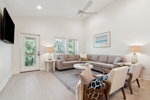 Abundant natural light fills the space, creating a bright and airy atmosphere.