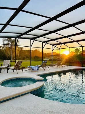 Watch the sunset from the pool deck