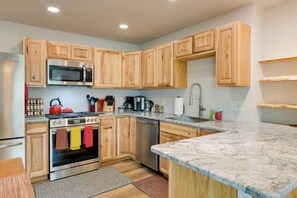 Fully Stocked Kitchen | Single-Story Apartment | In-Unit Laundry