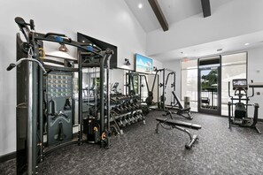 The room has a generous layout with ample space for movement and different workout activities