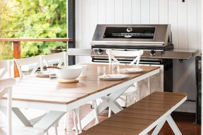 Outdoor dining & BBQ facilities.