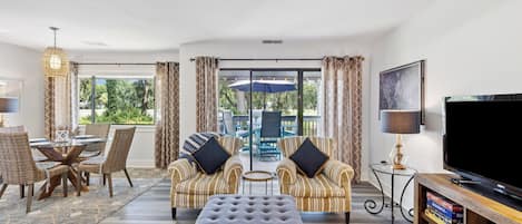 Spacious living area w/ lovely large patio and serene golf views